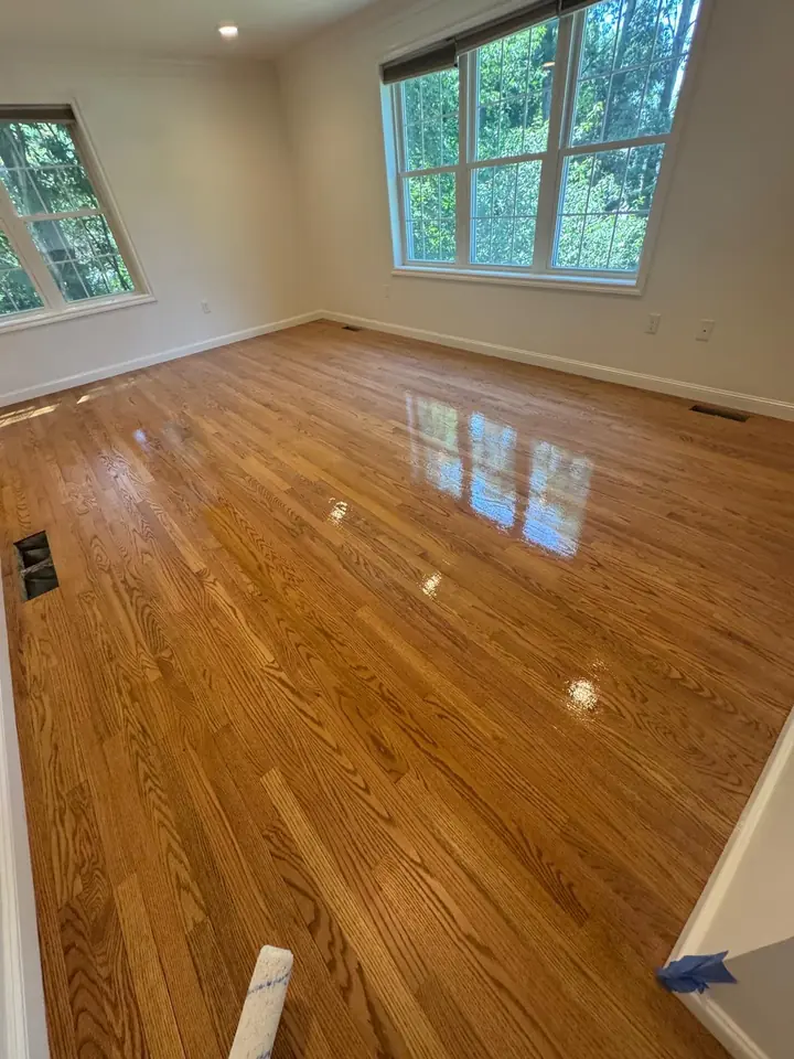 Natural hardwood floor with glossy finish