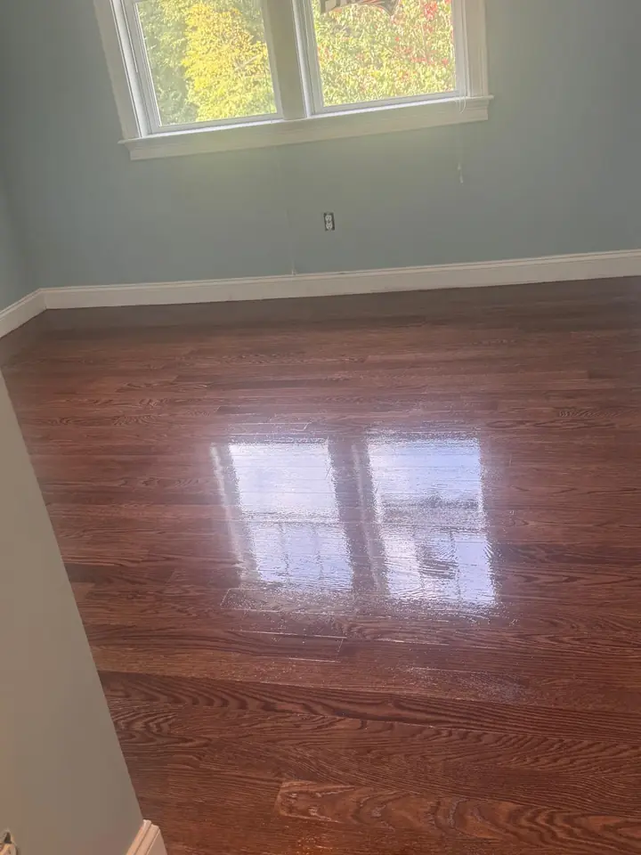 Bedroom hardwood floor refinished