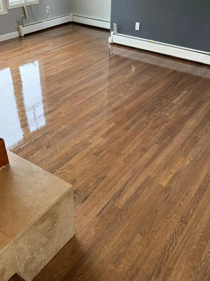 Glossy hardwood floor after refinishing