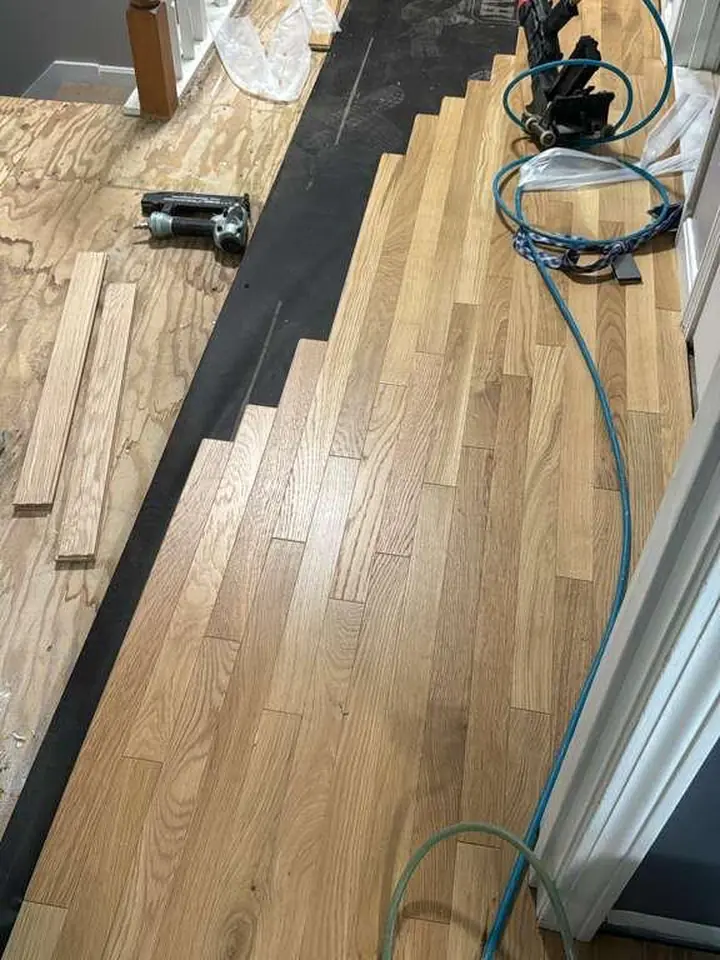 Hardwood installation in progress