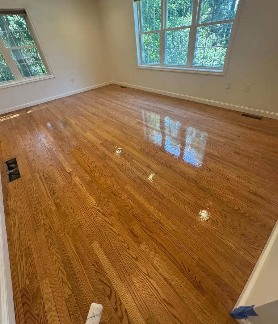 Natural hardwood floor with glossy finish