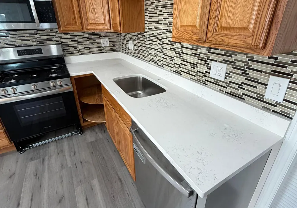 Kitchen cabinets and vinyl flooring project in Massachusetts by WD Art Painting