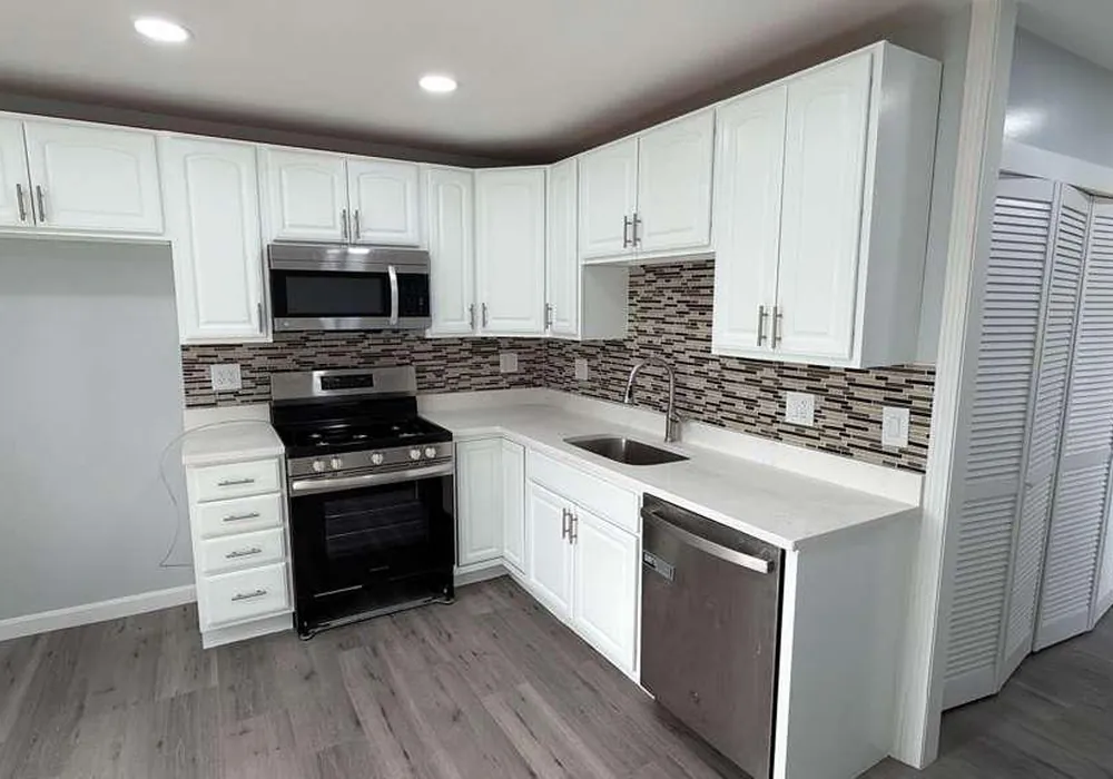 Kitchen cabinets and vinyl flooring project in Massachusetts by WD Art Painting
