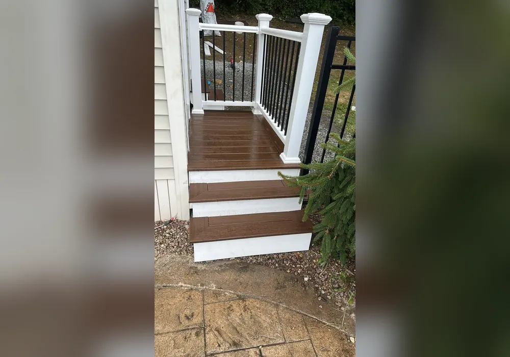 Deck stairs and railing painting in Massachusetts by WD Art Painting