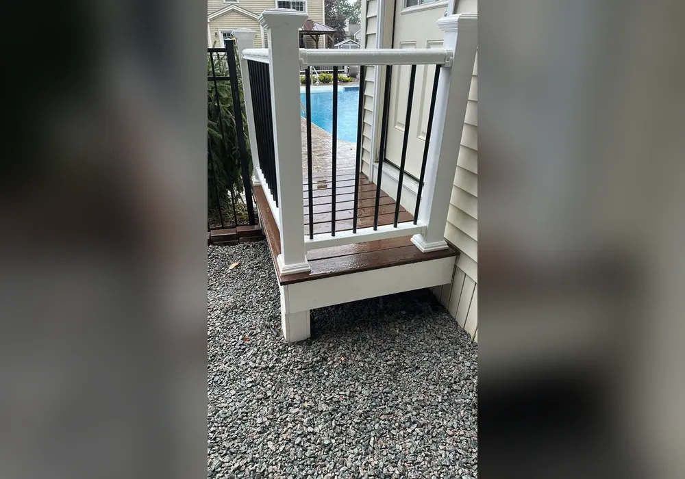 Deck stairs and railing painting in Massachusetts by WD Art Painting