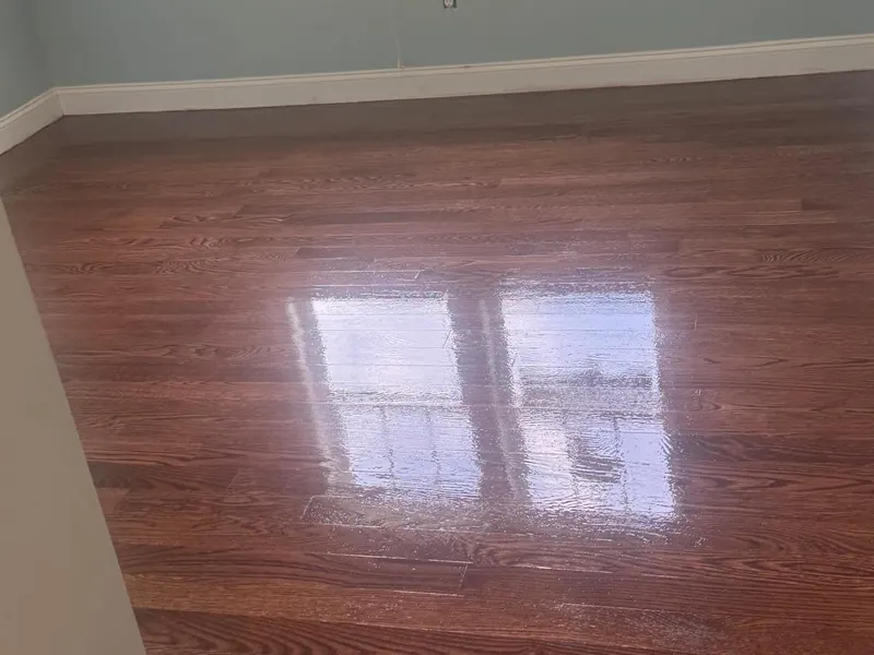 Glossy hardwood floor after refinishing